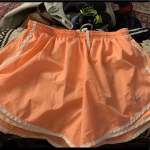 Women’s orange Nike Tempo shorts - size large